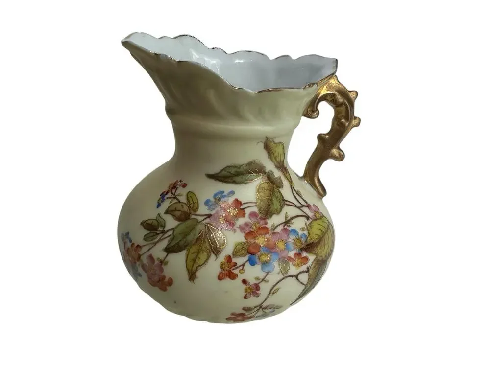 Rudolstadt Hand-Painted Porcelain Creamer with Floral Design and Gold Accents